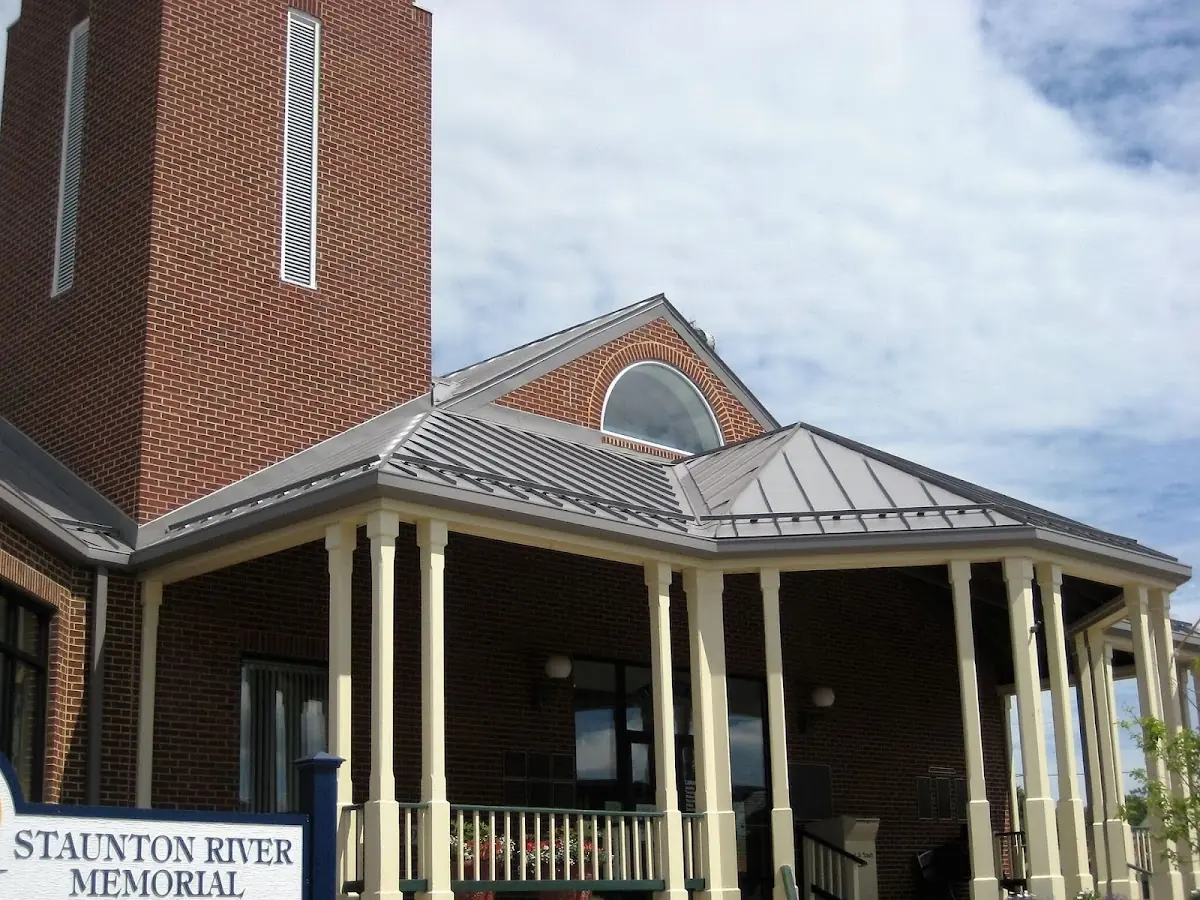 Skilled roofing craftsmen working on a residential roof in Kearny
